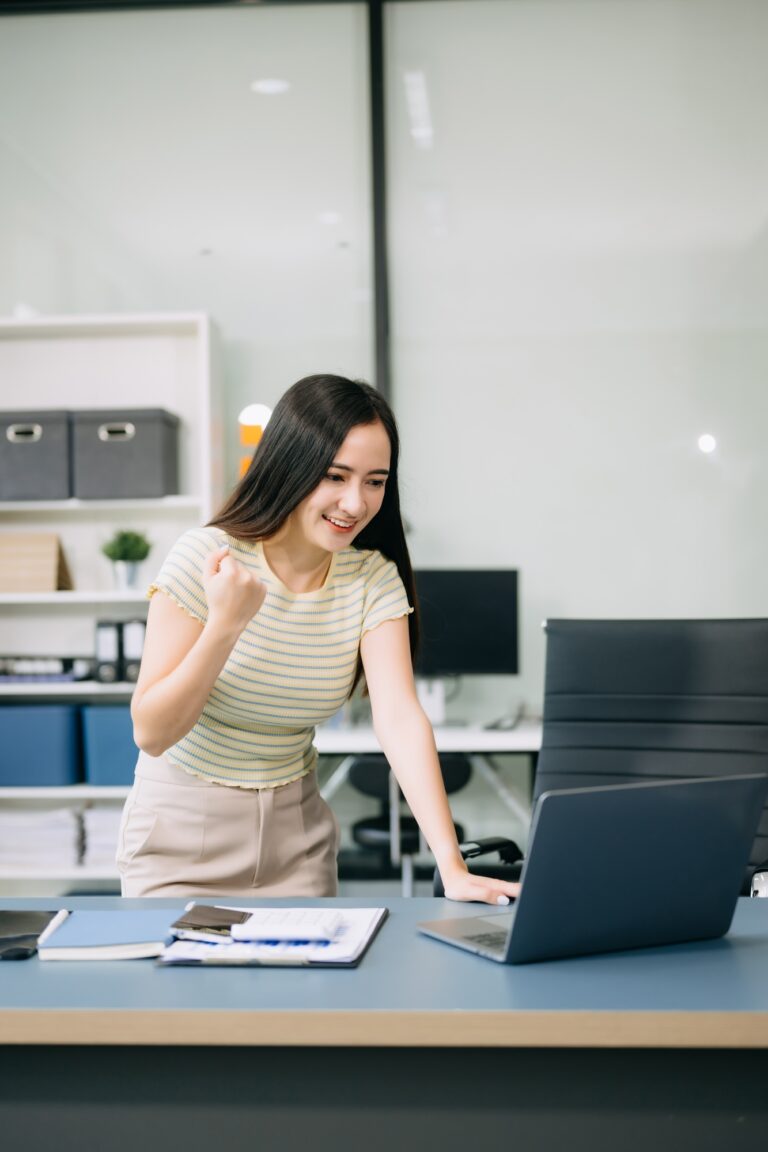 Asian Businesswoman hand working digital marketing media in virtual screen with mobile phone