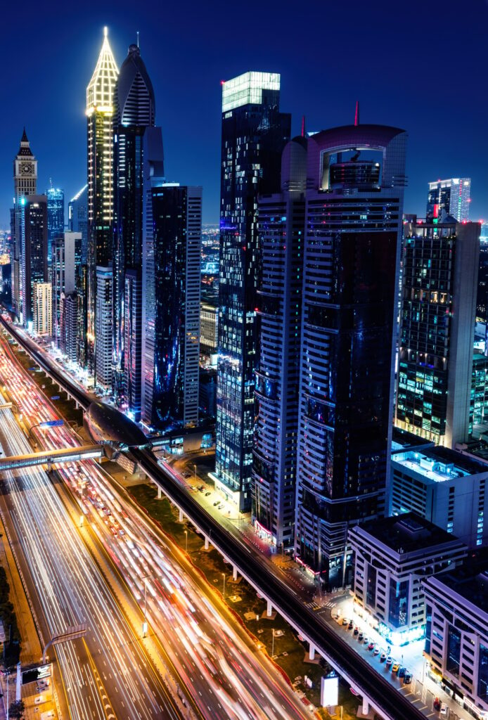 Skyscrapers highrise business buildings in downtown Dubai at night